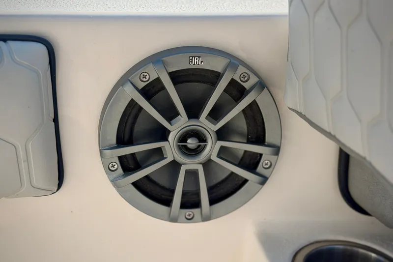Slide: The Image of JBL speaker on 2026 Carolina Skiff 22 Ultra Elite boat interior. - 32