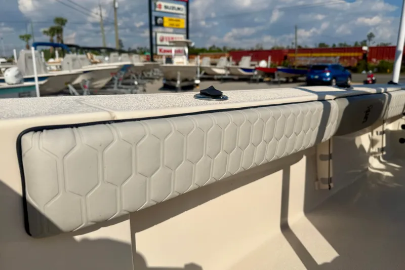 Slide: The Image of 2026 Carolina Skiff 22 Ultra Elite boat detail with textured padding, displayed outdoors. - 34