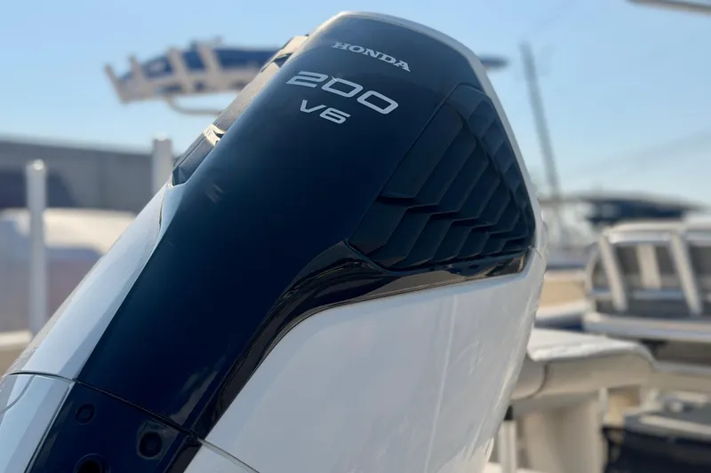 Slide: The Image of Close-up of a Honda 200 V6 outboard motor on a 2026 Carolina Skiff 22 Ultra Elite boat. - 37