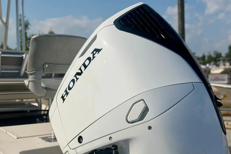 Slide: The Image of 2026 Carolina Skiff 22 Ultra Elite with Honda outboard motor, close-up view. - 38