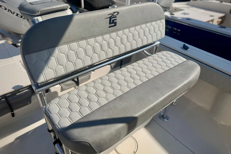 Slide: The Image of 2026 Carolina Skiff 22 Ultra Elite boat seat with hexagonal pattern upholstery. - 4