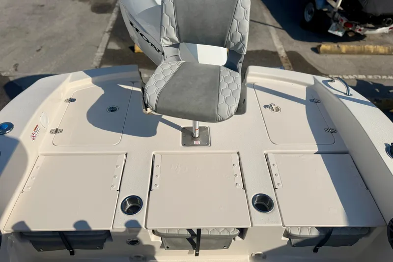 Slide: The Image of 2026 Carolina Skiff 22 Ultra Elite boat deck with seating and storage compartments. - 7