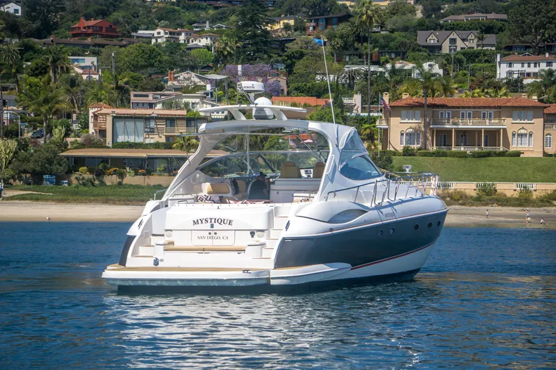 Slide: The Image of 2005 Cruisers Yachts 540 Express on water near luxury homes, San Diego. - 5