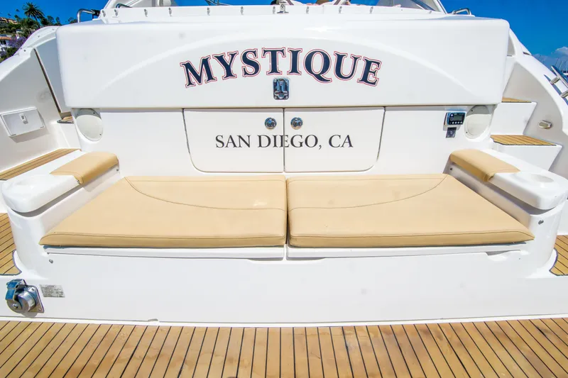 Slide: The Image of 2005 Cruisers Yachts 540 Express, rear seating area, docked in San Diego, CA. - 9