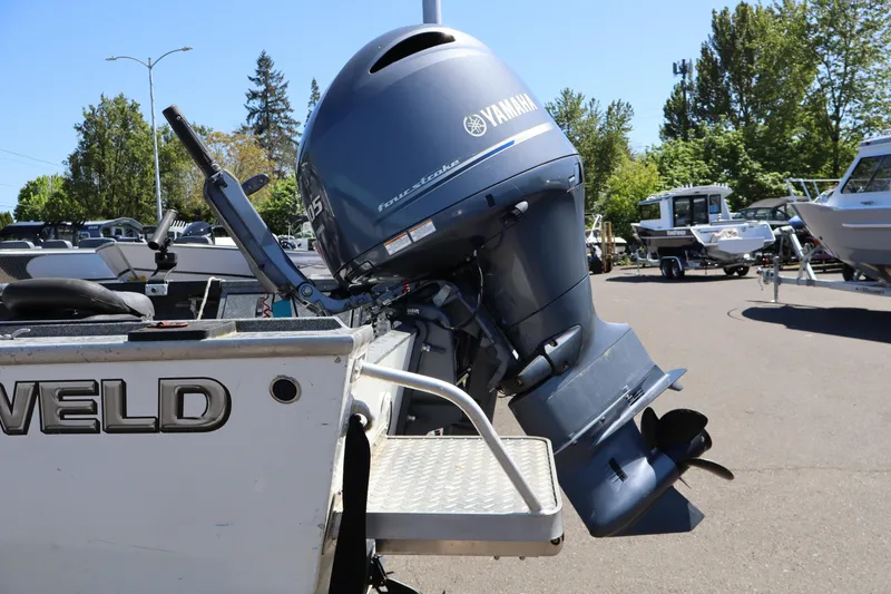 Slide: The Image of 2017 Alumaweld Super Vee LT 20 with Yamaha outboard motor in a marina setting. - 5