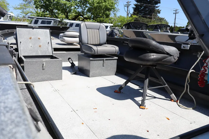 Slide: The Image of 2017 Alumaweld Super Vee LT 20 boat interior with seating and storage compartments. - 6
