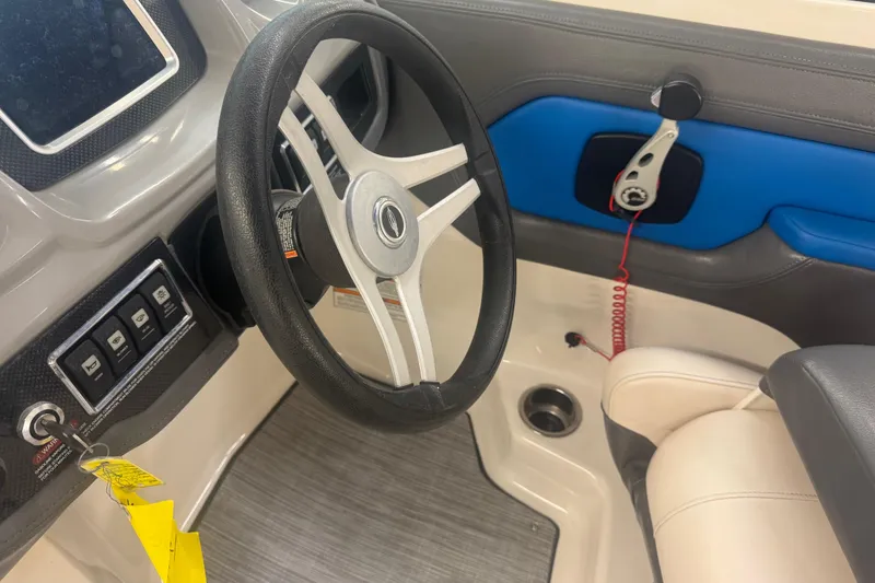 Slide: The Image of Interior view of 2017 Chaparral Vortex 203 VRX boat cockpit with steering wheel and controls. - 11