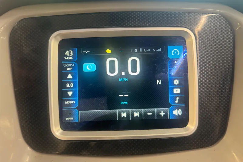 Slide: The Image of Dashboard display of a 2017 Chaparral Vortex 203 VRX showing speed and fuel level. - 12