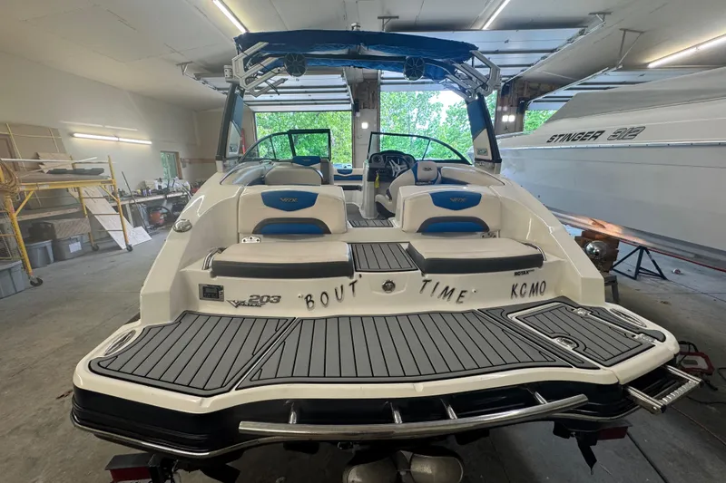 Slide: The Image of 2017 Chaparral Vortex 203 VRX boat in garage, rear view with seating and deck. - 6