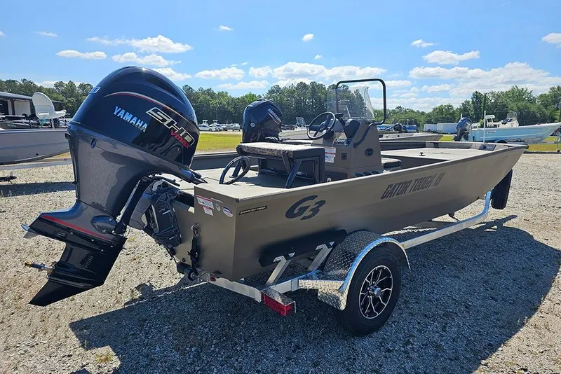 Slide: The Image of 2026 G3 Gator Tough 18 CC boat with Yamaha engine on trailer. - 21