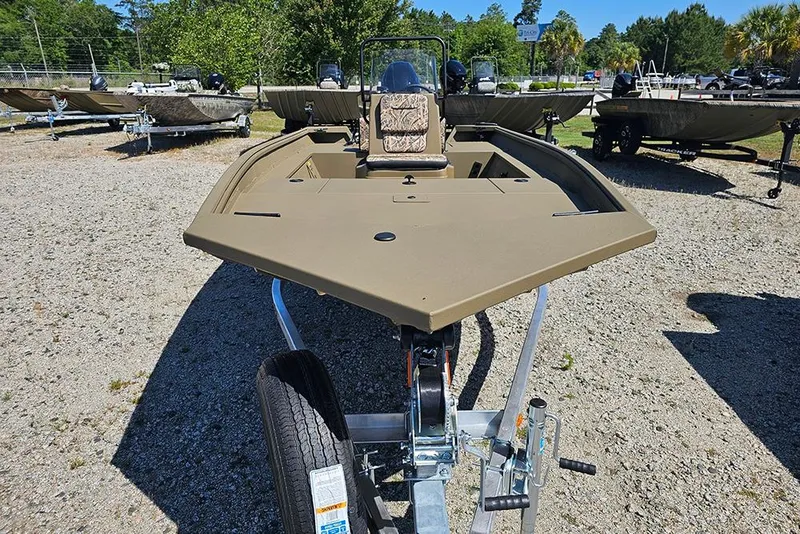 Slide: The Image of 2026 G3 Gator Tough 18 CC boat on trailer in outdoor setting. - 22