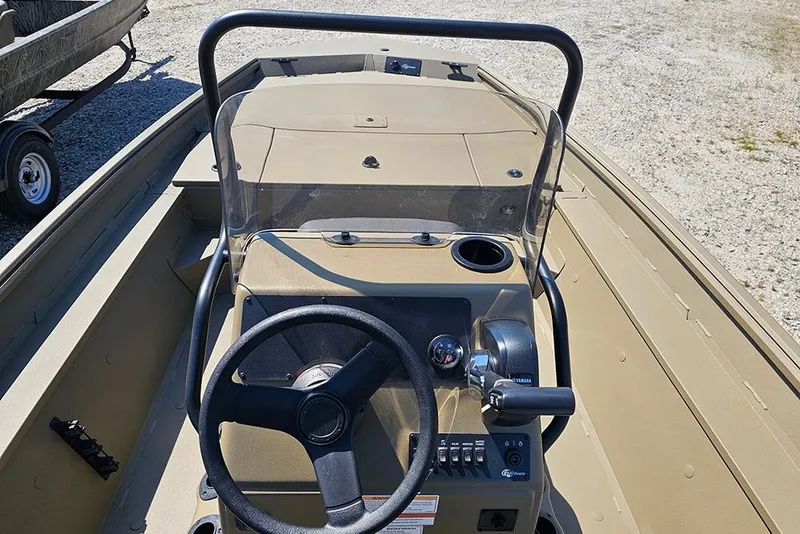 Slide: The Image of 2026 G3 Gator Tough 18 CC boat interior with steering wheel and controls. - 32