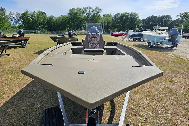 Slide: The Image of 2026 G3 Gator Tough 18 CC boat displayed outdoors on a grassy area. - 4