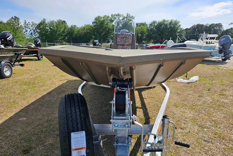 Slide: The Image of 2026 G3 Gator Tough 18 CC boat on trailer, parked outdoors. - 5