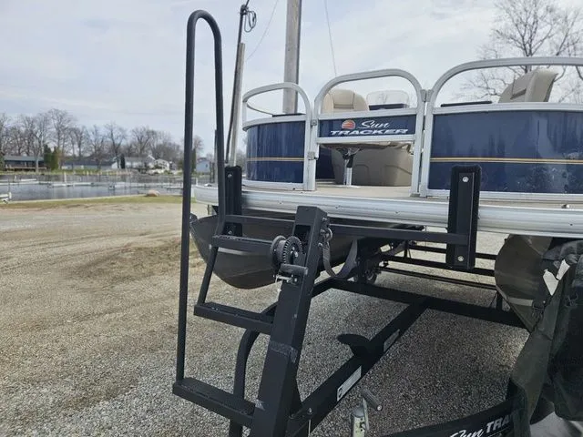 Slide: The Image of Sun Tracker Bass Buggy 16 XL 2020 on trailer by lakeside. - 11