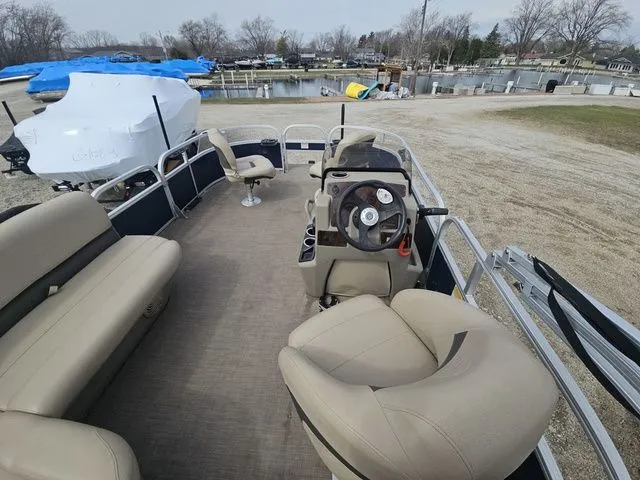 Slide: The Image of Interior of a 2020 Sun Tracker Bass Buggy® 16 XL pontoon boat at dock. - 8