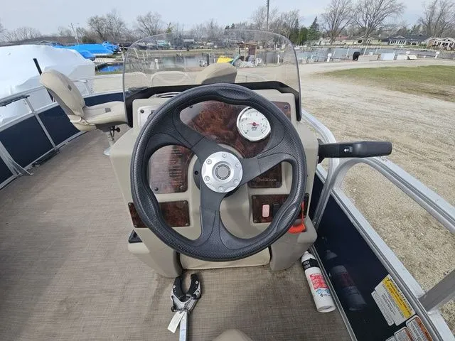 Slide: The Image of Steering console of a 2020 Sun Tracker Bass Buggy® 16 XL pontoon boat. - 9