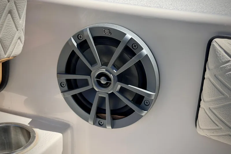 Slide: The Image of JBL speaker installed on 2026 Carolina Skiff 24 Ultra Elite boat interior. - 17