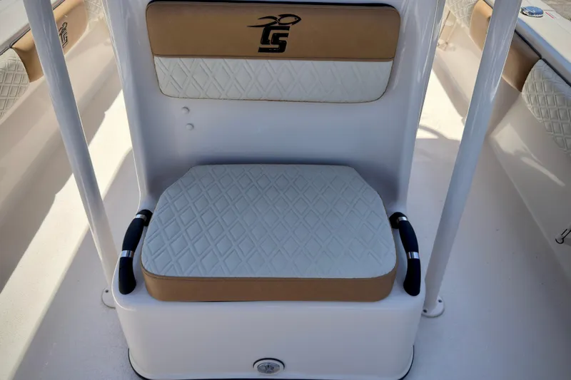 Slide: The Image of 2026 Carolina Skiff 24 Ultra Elite boat seat with diamond-patterned upholstery. - 22
