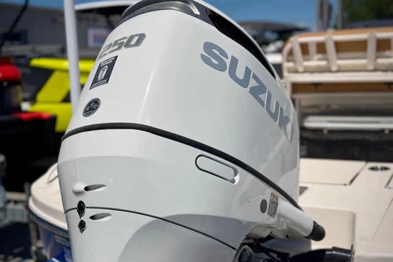 Slide: The Image of Suzuki 250 outboard motor on 2026 Carolina Skiff 24 Ultra Elite boat. - 26