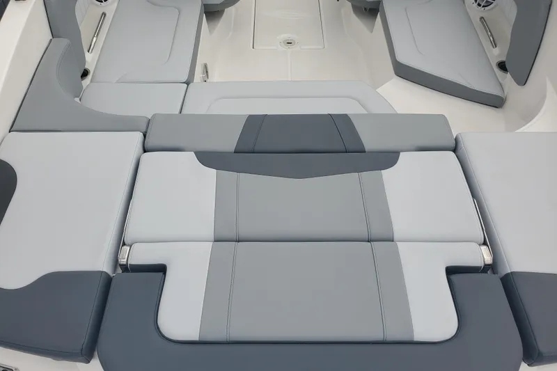 Slide: The Image of 2026 Chaparral 23 SSi boat interior with sleek gray seating and modern design. - 9