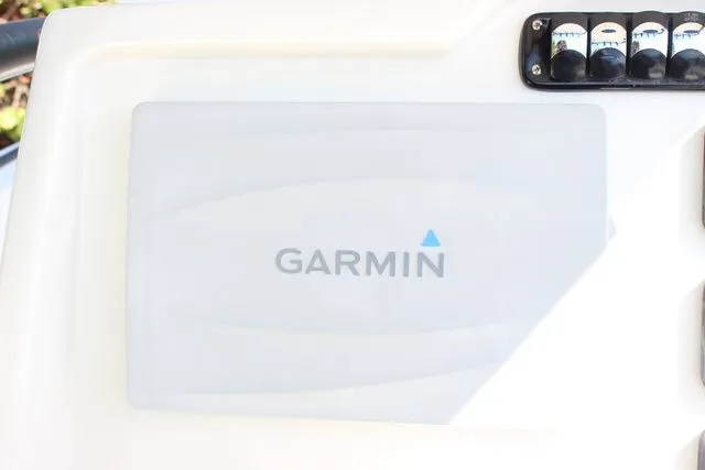 Slide: The Image of Garmin device on a 2015 Sailfish 240 CC boat. - 21