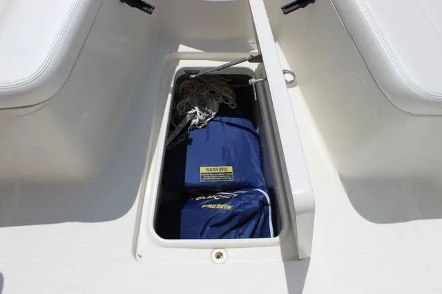 Slide: The Image of Storage compartment in 2015 Sailfish 240 CC boat with anchor and ropes. - 42