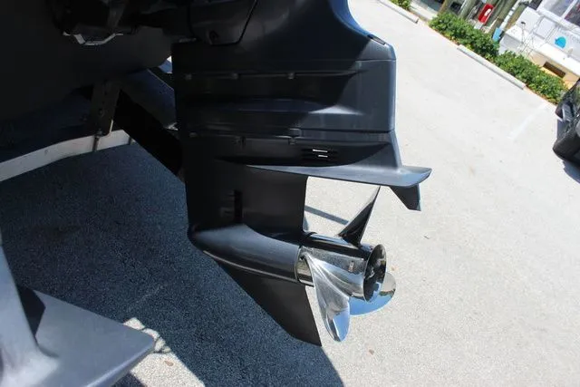 Slide: The Image of Close-up of the outboard motor on a 2015 Sailfish 240 CC boat. - 49