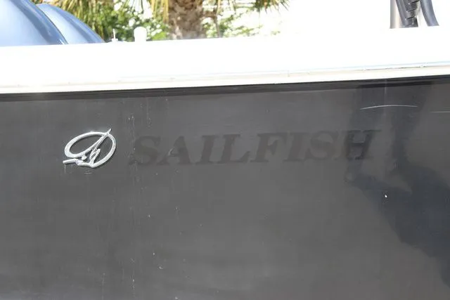Slide: The Image of Black 2015 Sailfish 240 CC boat with logo. - 5