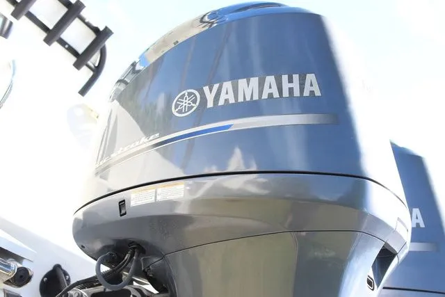 Slide: The Image of Yamaha outboard motor on a 2015 Sailfish 240 CC boat. - 8