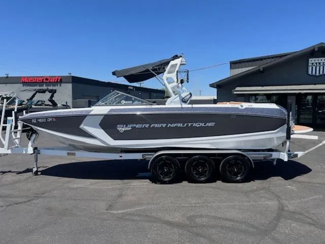 The Image of 2017 Nautique G25 boat on trailer, side view. - 1