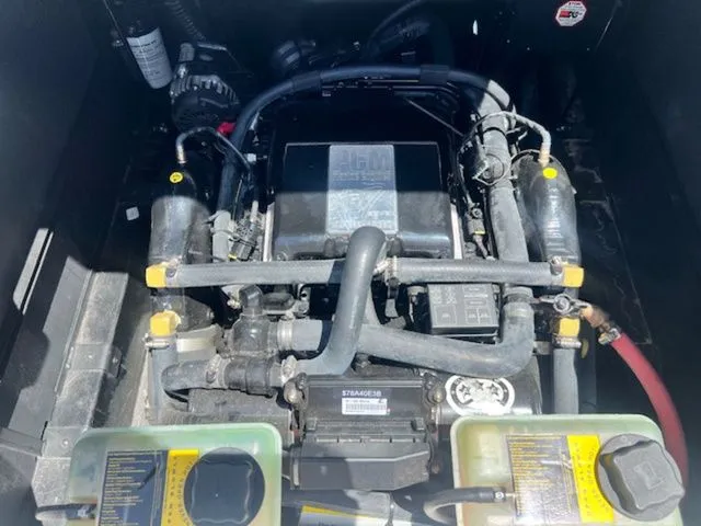 Slide: The Image of Engine compartment of a 2017 Nautique G25 boat, close-up view. - 20