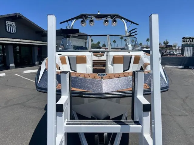 Slide: The Image of 2017 Nautique G25 boat on trailer, front view. - 3
