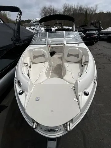 Slide: The Image of 2013 Stingray 208 LR boat with open cockpit and seating. - 10