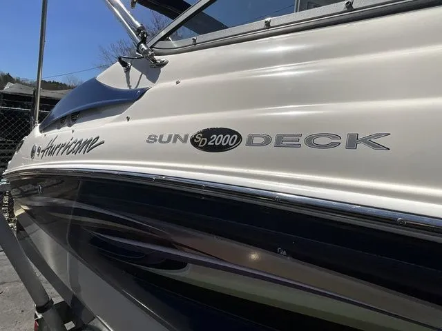 Slide: The Image of Close-up of a Hurricane SunDeck 2000 boat, 2013 model. - 11