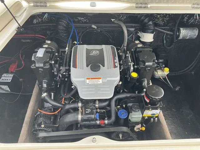 Slide: The Image of Engine compartment of a 2013 Stingray 208 LR boat with 4.3L engine. - 22