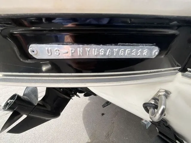 Slide: The Image of Close-up of the serial number on a 2013 Stingray 208 LR boat. - 39