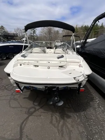 Slide: The Image of 2013 Stingray 208 LR boat, rear view on parking lot. - 5