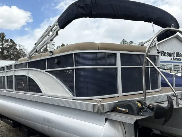 Slide: The Image of 2018 Bennington 21 SLX pontoon boat with canopy and outboard motor. - 4