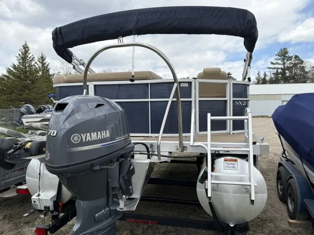 Slide: The Image of 2018 Bennington 21 SLX pontoon boat with Yamaha engine, side view. - 6