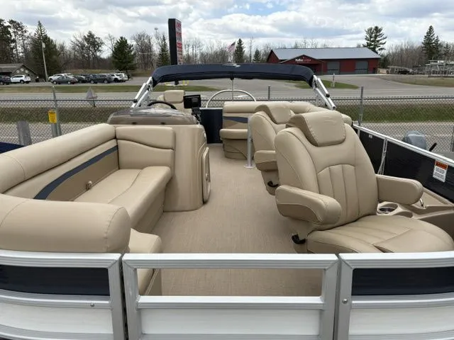 Slide: The Image of 2018 Bennington 21 SLX pontoon boat with luxurious seating and open deck. - 8