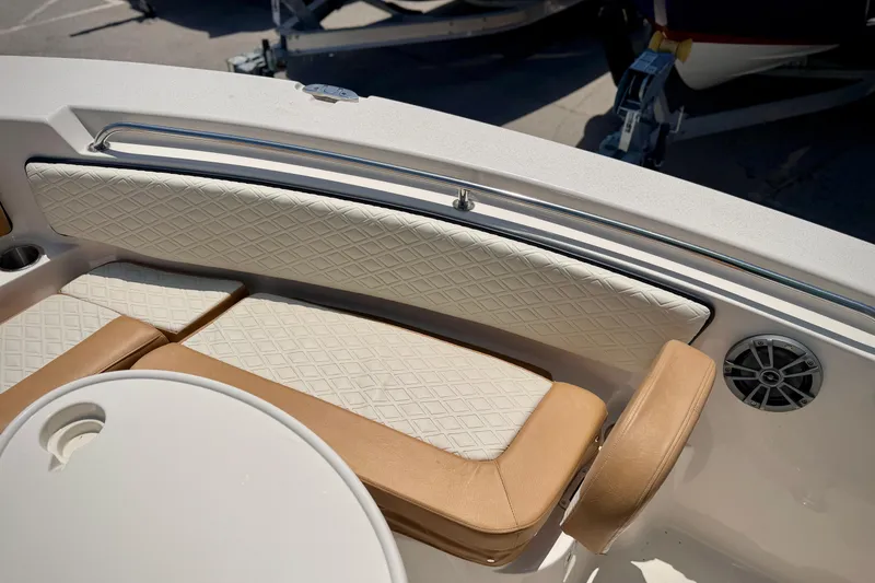 Slide: The Image of Luxurious seating on 2026 Sea Chaser 22 HFC boat with diamond-pattern upholstery. - 19