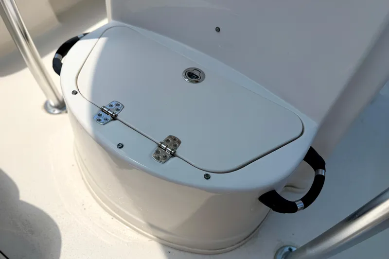 Slide: The Image of Storage compartment on 2026 Sea Chaser 22 HFC boat, featuring secure latches and handles. - 24