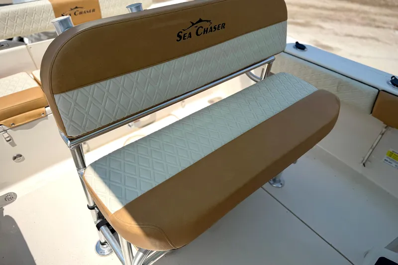 Slide: The Image of 2026 Sea Chaser 22 HFC boat seat with tan and white upholstery. - 28
