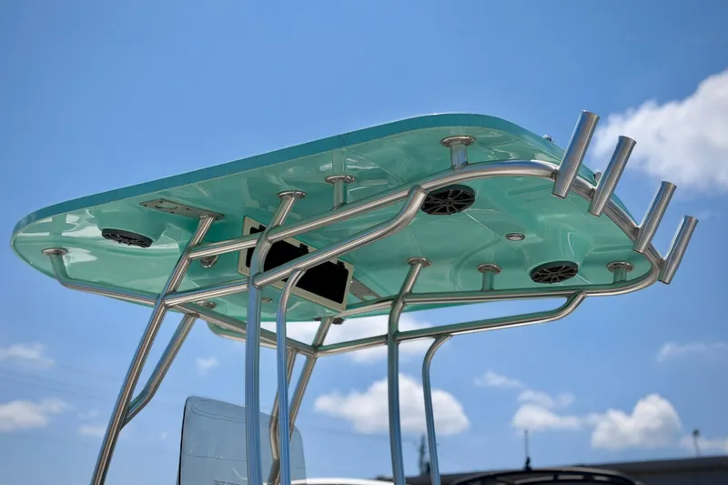 Slide: The Image of T-top of 2026 Sea Chaser 22 HFC boat against blue sky. - 4