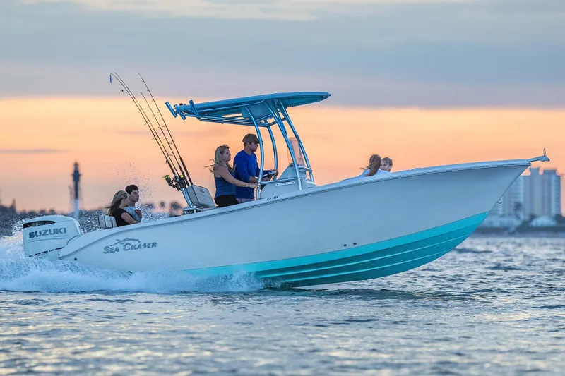 Slide: The Image of Manufacturer Provided Image: 2026 Sea Chaser 22 HFC boat cruising at sunset with passengers onboard. - 65