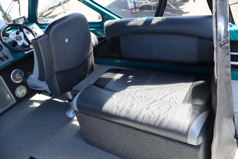 Slide: The Image of Interior of 2019 Northwest 208 SeaStar boat with seating and steering wheel. - 10