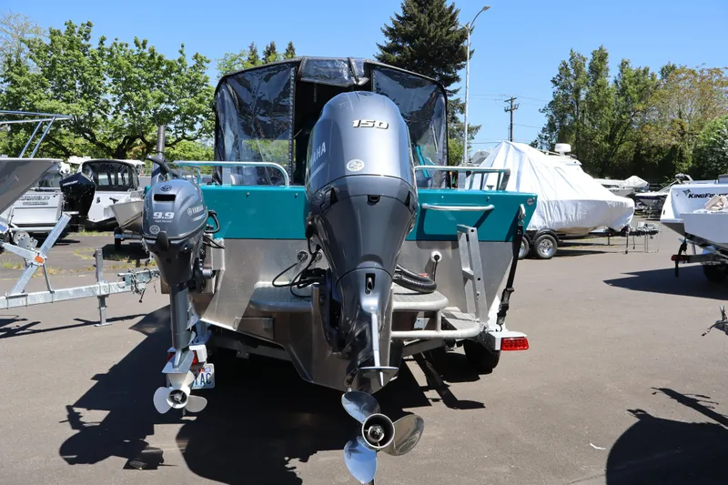 Slide: The Image of 2019 Northwest 208 SeaStar boat with dual Yamaha outboard motors in a marina setting. - 3