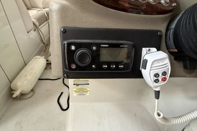 Slide: The Image of 2015 Crownline Eclipse E2 XS boat dashboard with Fusion MS-RA55 stereo system. - 9