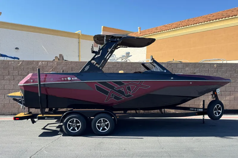 The Image of 2020 ATX 22 TYPE S boat on trailer, parked outdoors, side view. - 0